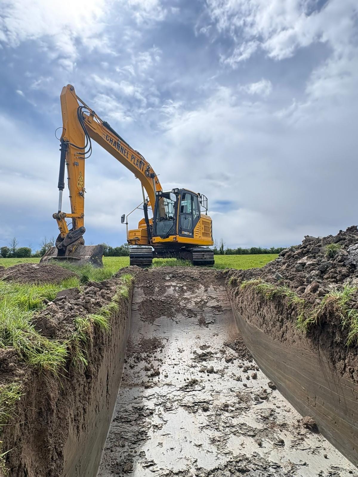 Digger carrying out groundworks for a Bristol project